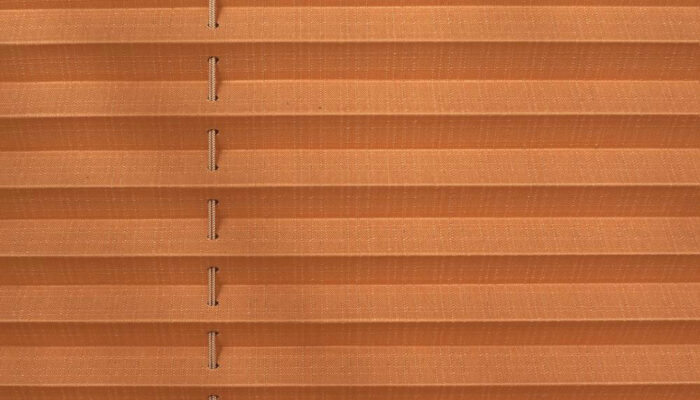 Honeycomb blinds for covering windows and other structures