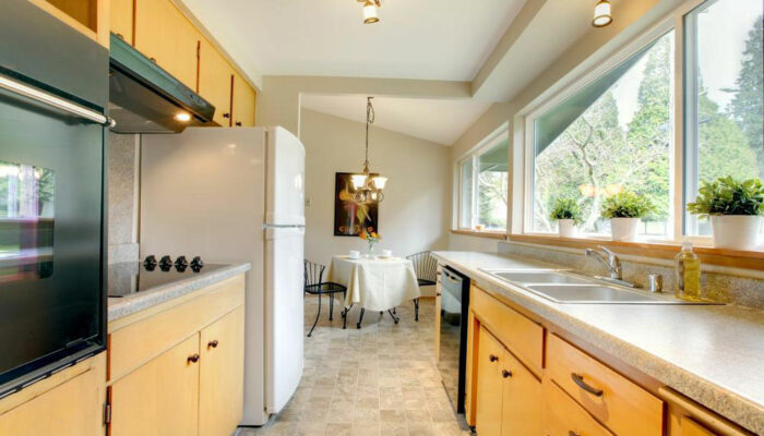 Installing assembled kitchen cabinets saves money and space