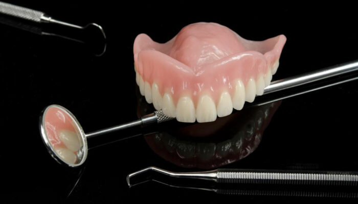 Pros and cons of dentures