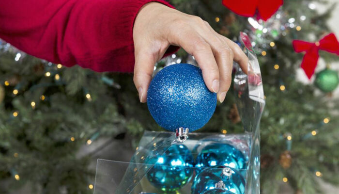 Tips for deciding if a Santa tree topper is right for your tree