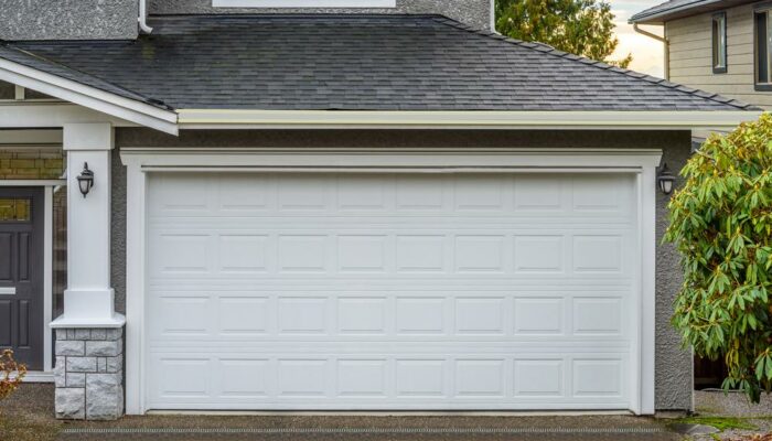 Vinyl and wooden garage door choices for modern houses